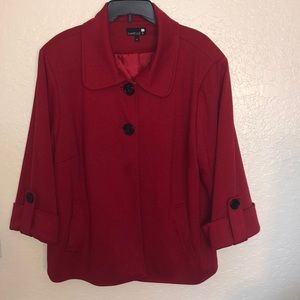 The brand is Danielle B. The size is 1x. It is red with black buttons.